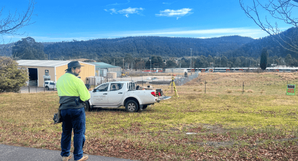 Vince Morgan surveyor completing field work on a development site